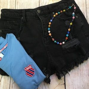black ripped denim shorts